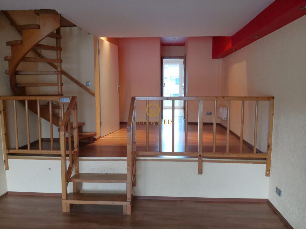 Eingangsbereich im Galeriestil